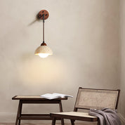 Eurynome - Travertine Dome Wall Light