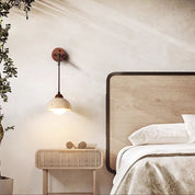 Eurynome - Travertine Dome Wall Light