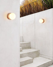 Triton - Hand-Polished Travertine Wall Light