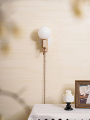 Dione - Travertine and Opal Globe Sconce