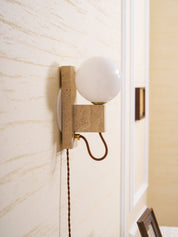 Dione - Travertine and Opal Globe Sconce