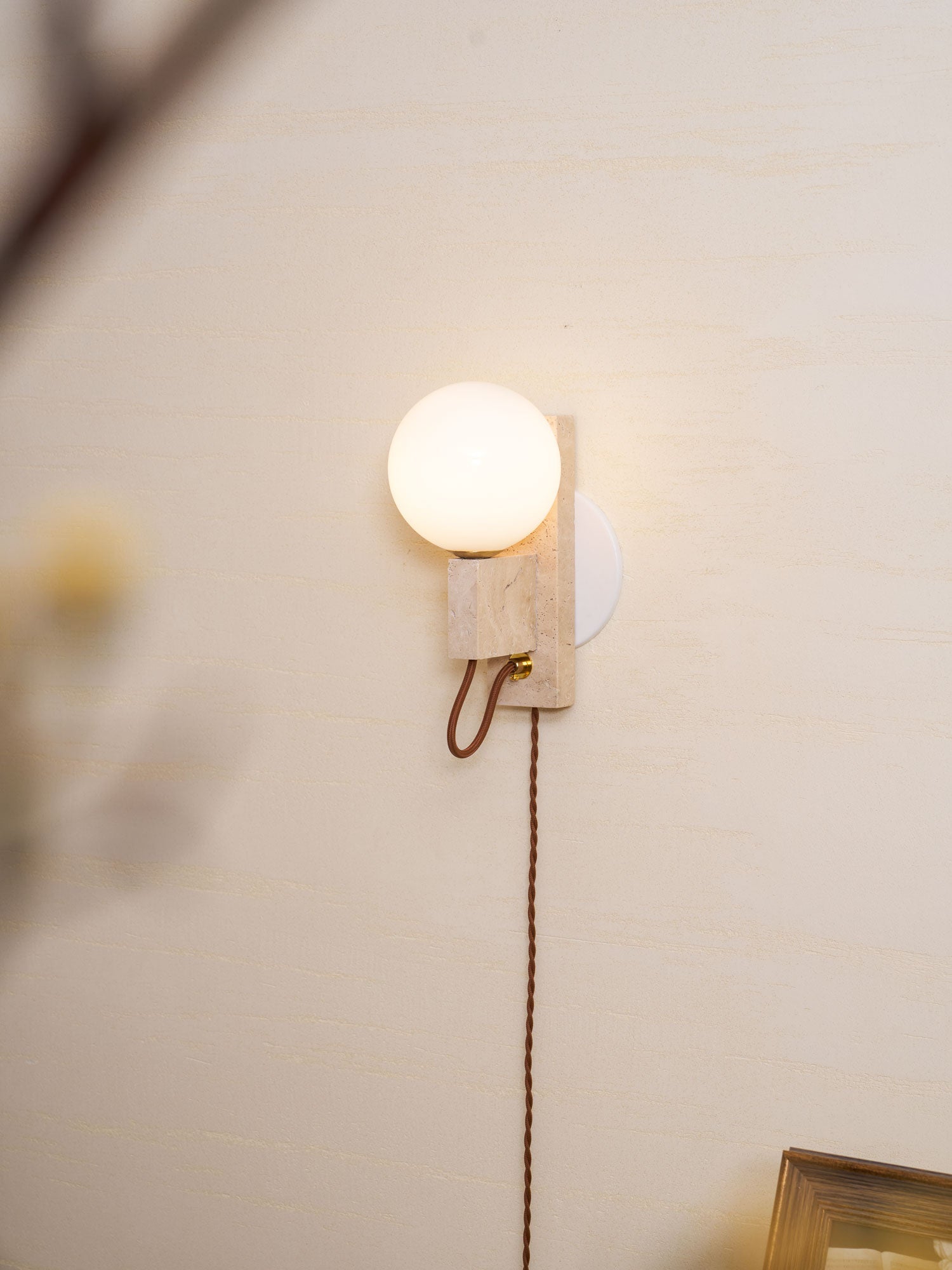 Dione - Travertine and Opal Globe Sconce