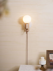 Dione - Travertine and Opal Globe Sconce