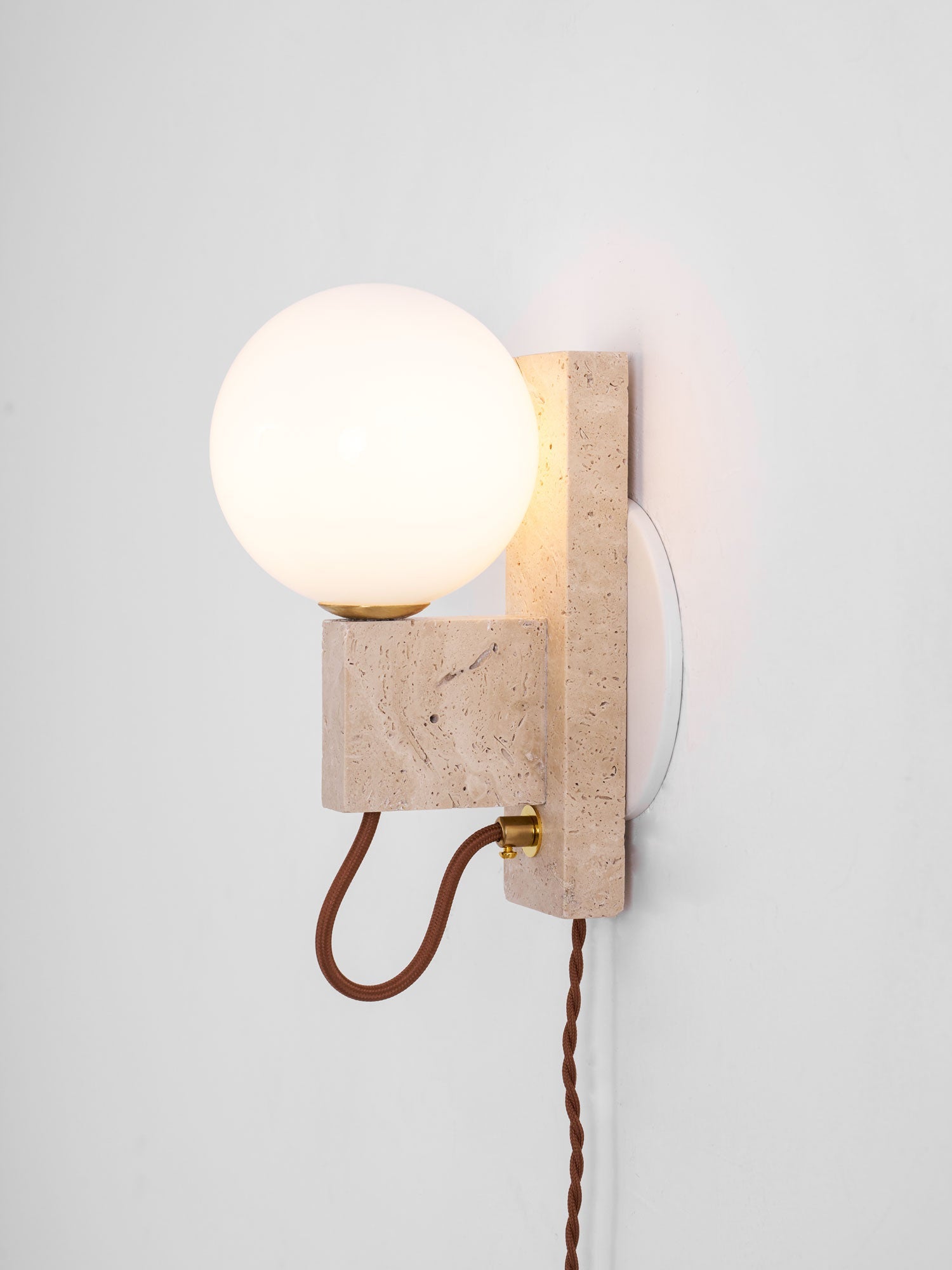 Dione - Travertine and Opal Globe Sconce