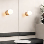 Kepheus - Travertine and Glass Globe Sconce