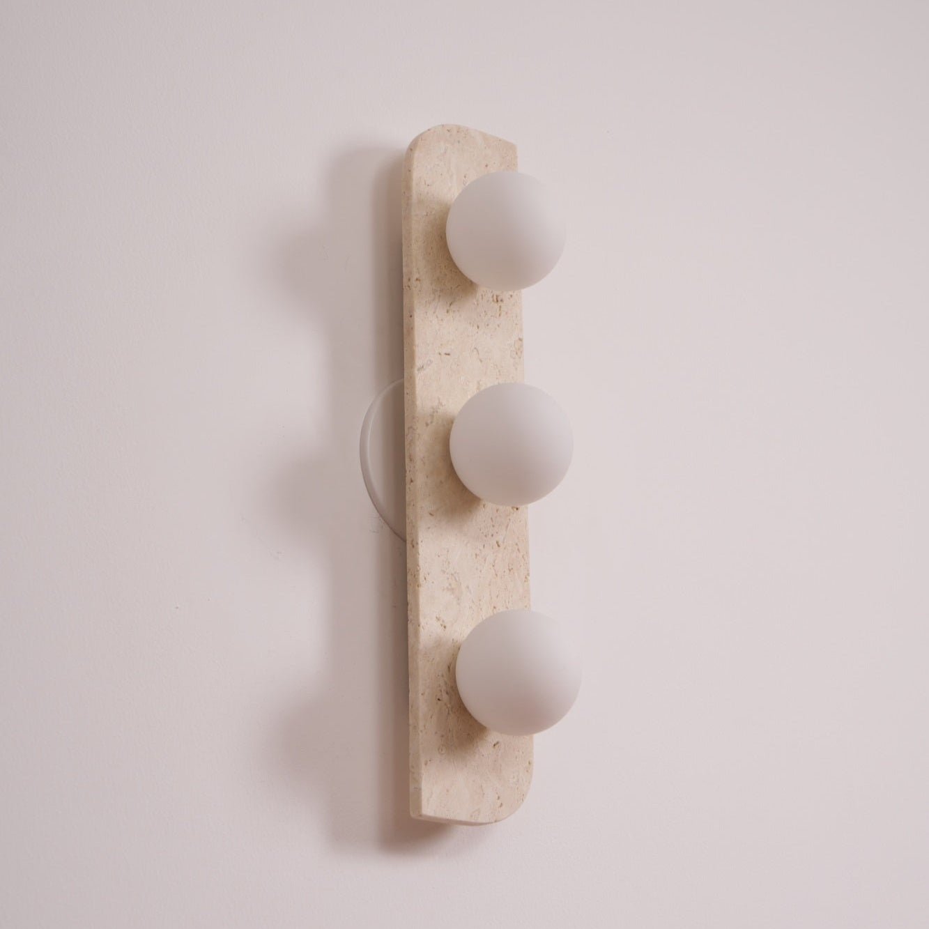 Glauke - Travertine and Glass Globe Plug-In Light