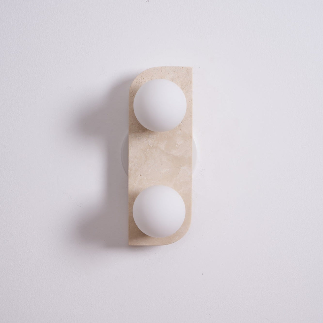 Glauke - Travertine and Glass Globe Plug-In Light