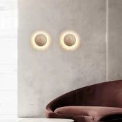 Astraia - Round Travertine Wall Light
