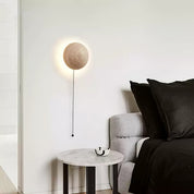Astraia - Round Travertine Wall Light