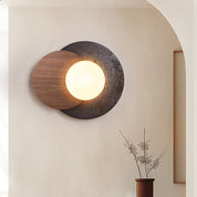 Themisto - Black Travertine and Walnut Sconce