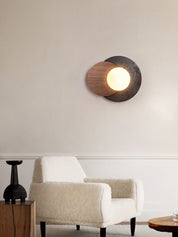 Themisto - Black Travertine and Walnut Sconce