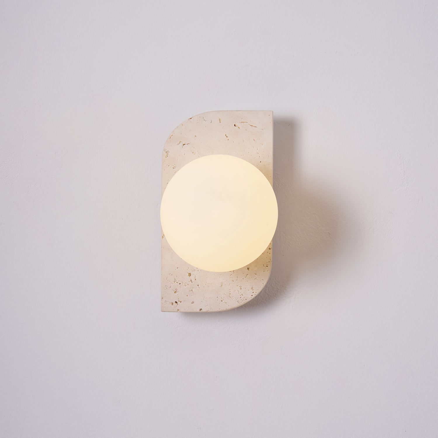 Glauke - Travertine and Glass Globe Plug-In Light