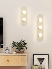Orthia - Frosted Globe Travertine Sconce