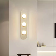 Orthia - Frosted Globe Travertine Sconce