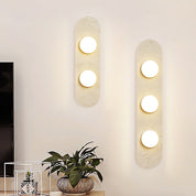 Orthia - Frosted Globe Travertine Sconce