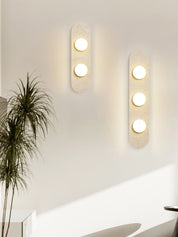 Orthia - Frosted Globe Travertine Sconce