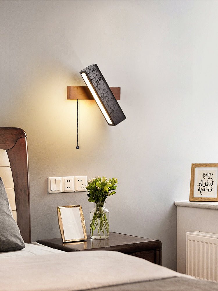 Thebe - Pivoting Black Travertine Wall Light