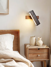 Thebe - Pivoting Black Travertine Wall Light