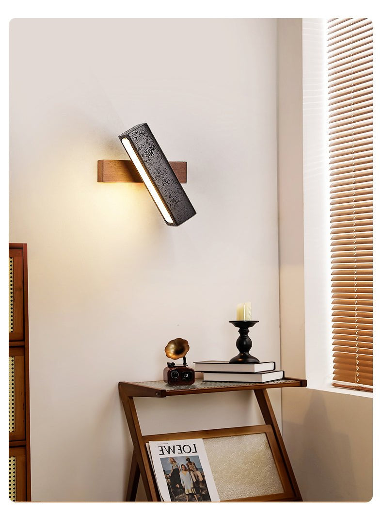 Thebe - Pivoting Black Travertine Wall Light