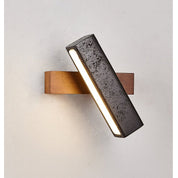 Thebe - Pivoting Black Travertine Wall Light