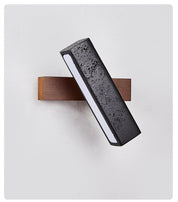Thebe - Pivoting Black Travertine Wall Light