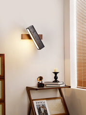Thebe - Pivoting Black Travertine Wall Light