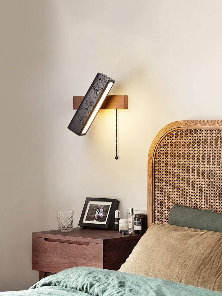 Thebe - Pivoting Black Travertine Wall Light