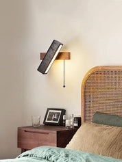 Thebe - Pivoting Black Travertine Wall Light