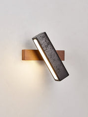Thebe - Pivoting Black Travertine Wall Light