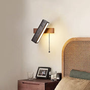 Thebe - Pivoting Black Travertine Wall Light