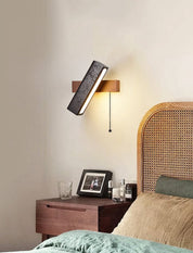 Thebe - Pivoting Black Travertine Wall Light
