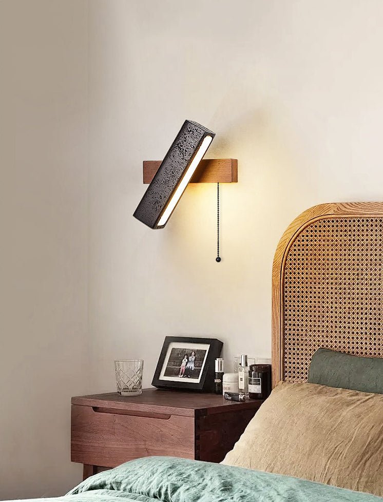 Thebe - Pivoting Black Travertine Wall Light