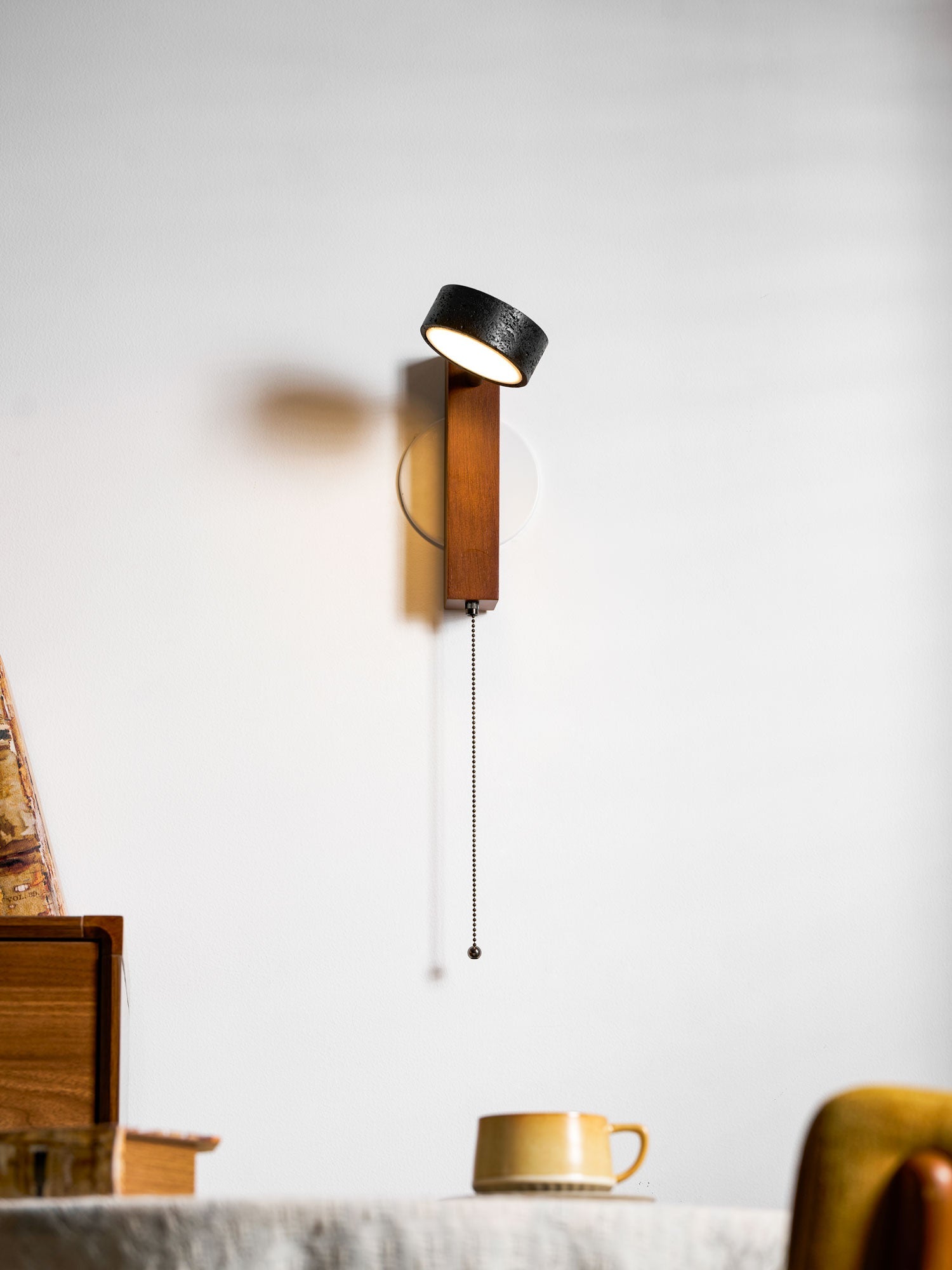 Kelaino - Black Travertine Wall Sconce