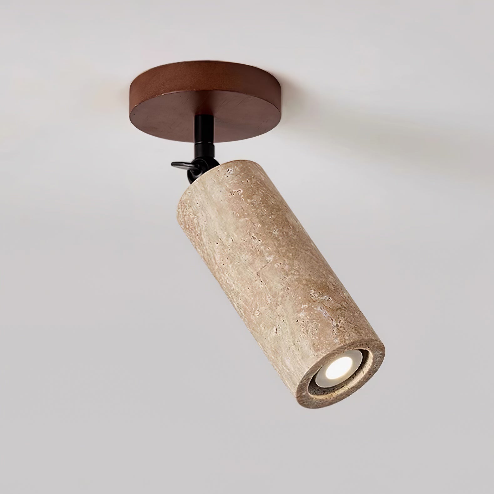 Ganymede - Swivel Travertine Wall Light