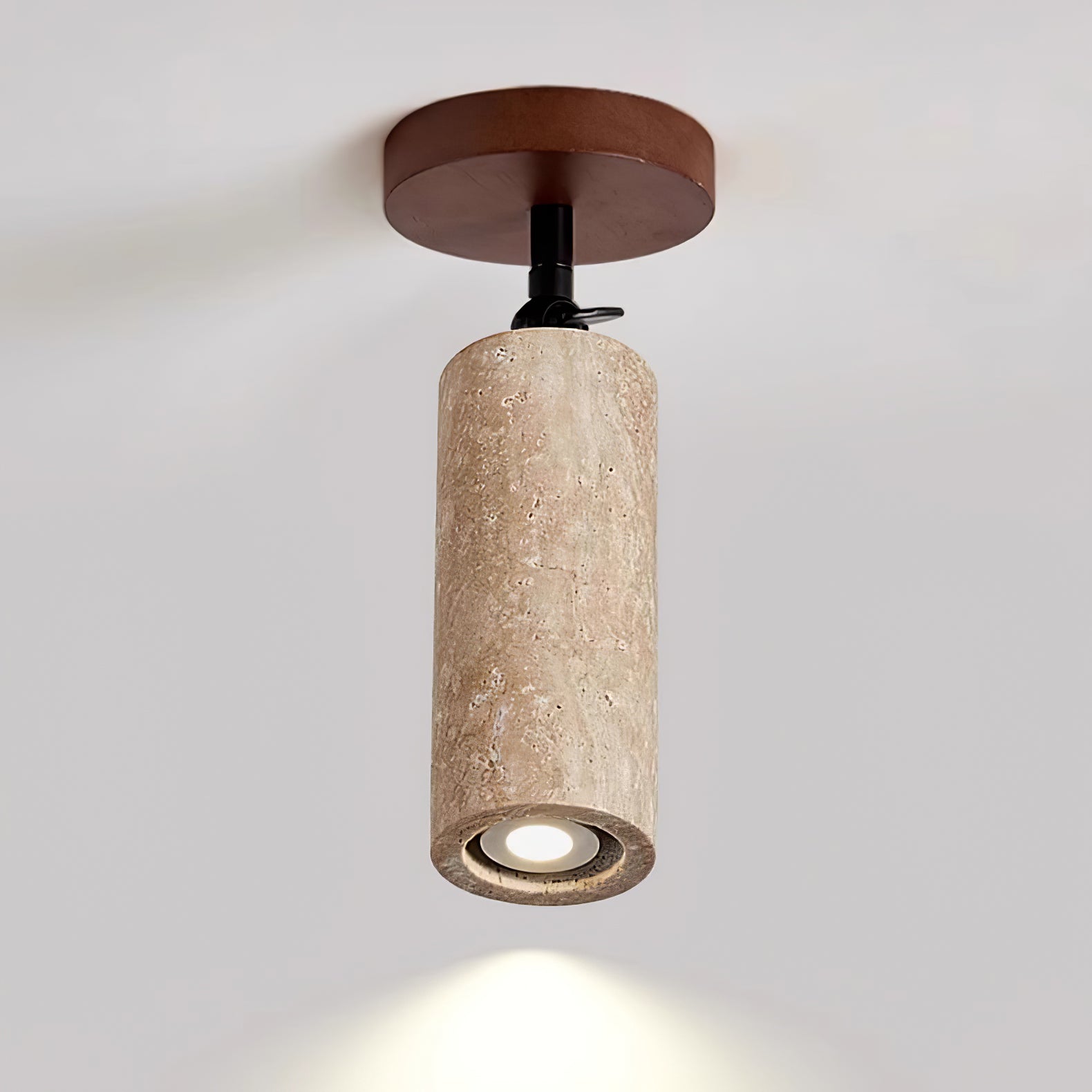 Ganymede - Swivel Travertine Wall Light