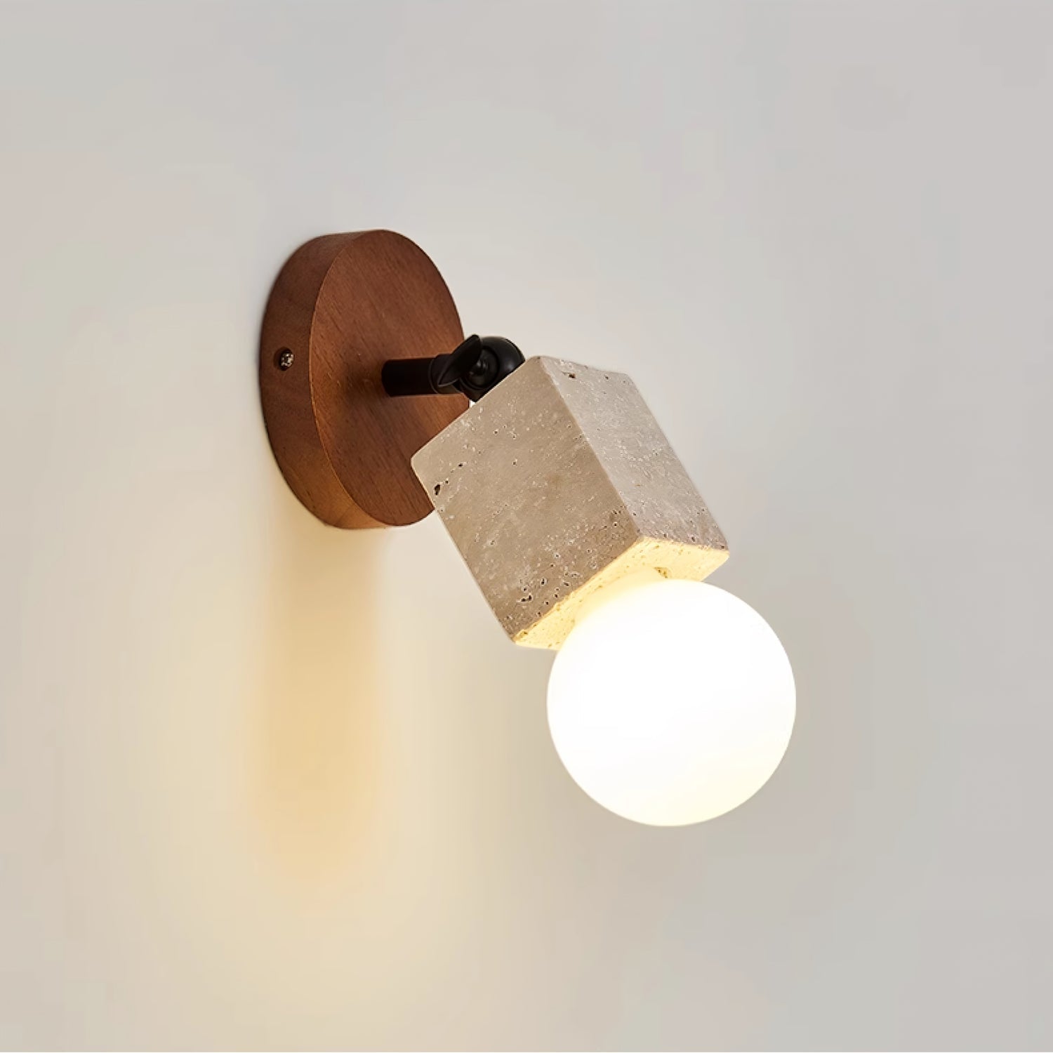 Ganymede - Swivel Travertine Wall Light