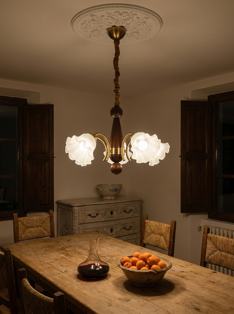 Demophon chandelier at night as the only light in a farmhouse dining room