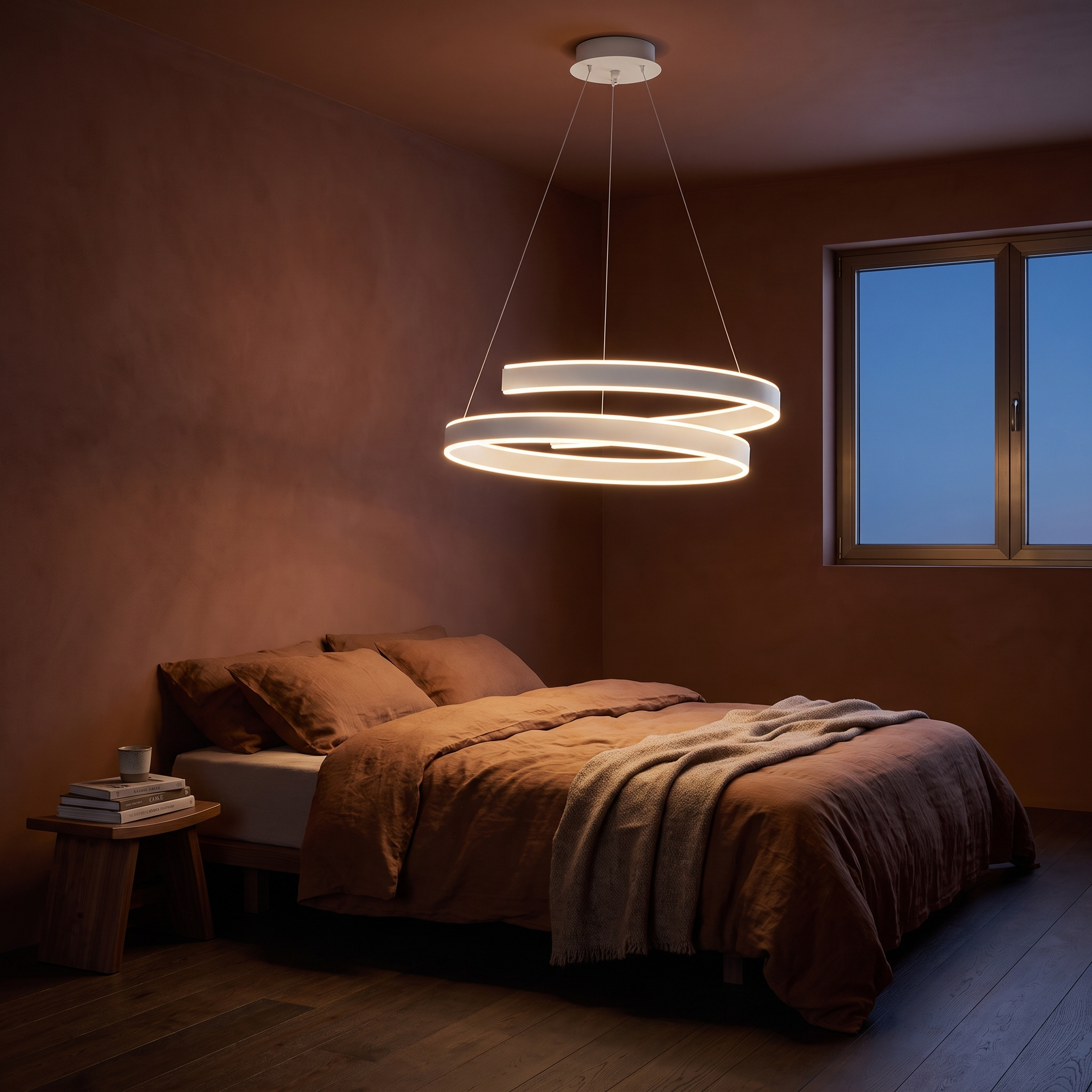 Andromache ringed Nordic LED chandelier in matte white lit in a dusk bedroom with terracotta limewash walls and linen bedding