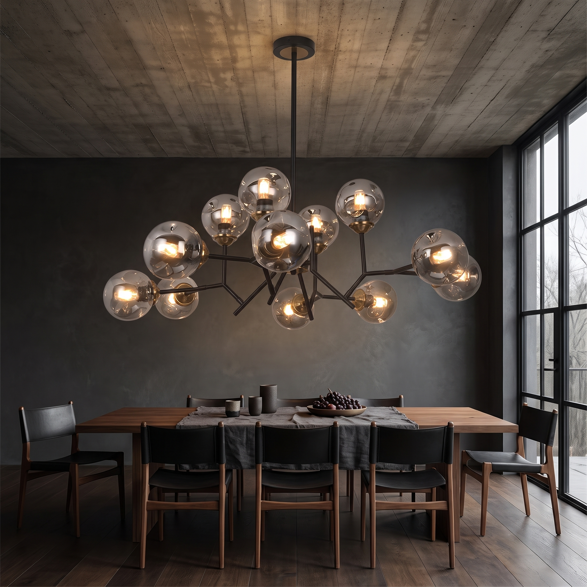 Deiphobos twelve-globe glass chandelier lit above a walnut dining table in a moody concrete and charcoal dining room