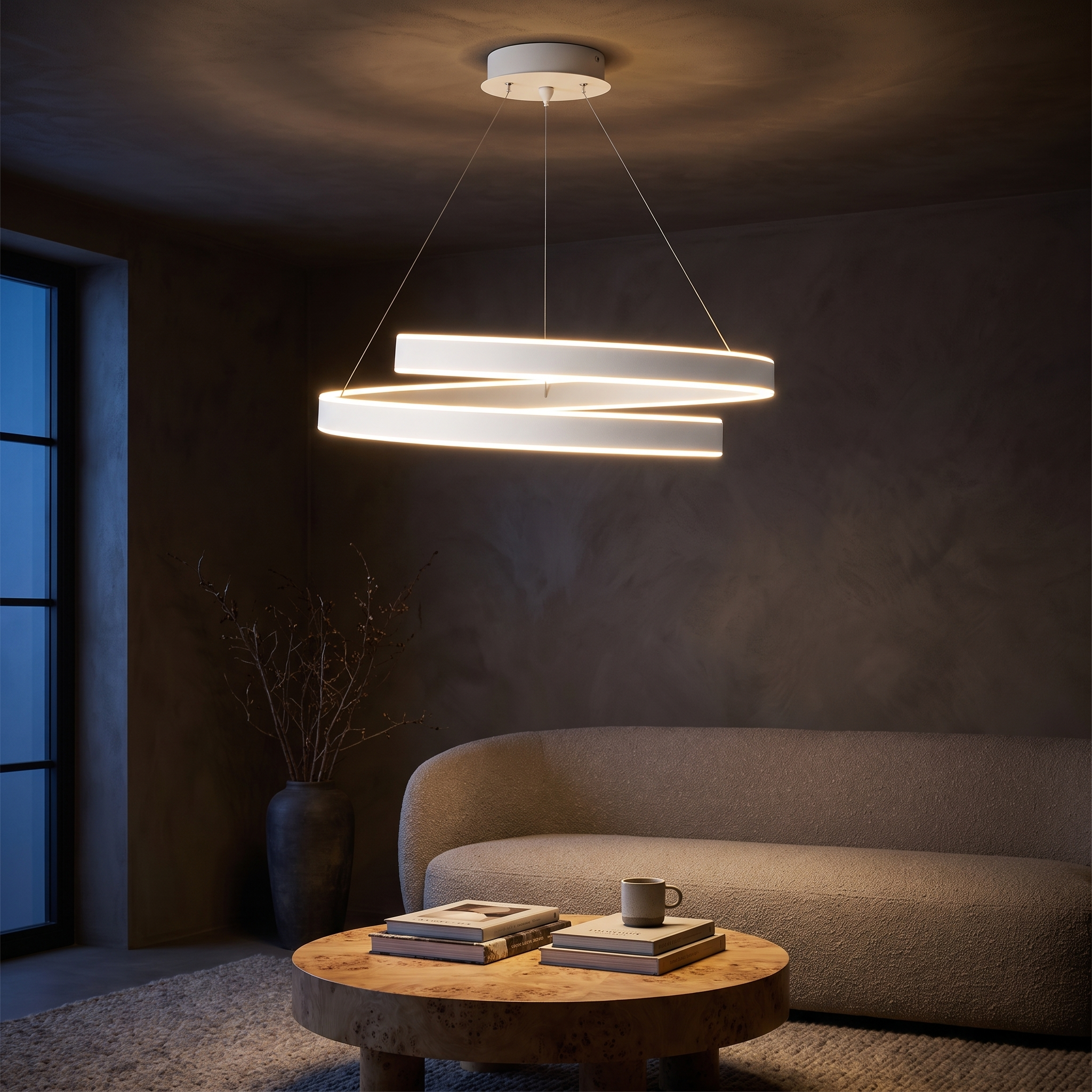 Andromache Ringed Nordic LED Chandelier glowing in a dark limewash evening sitting room
