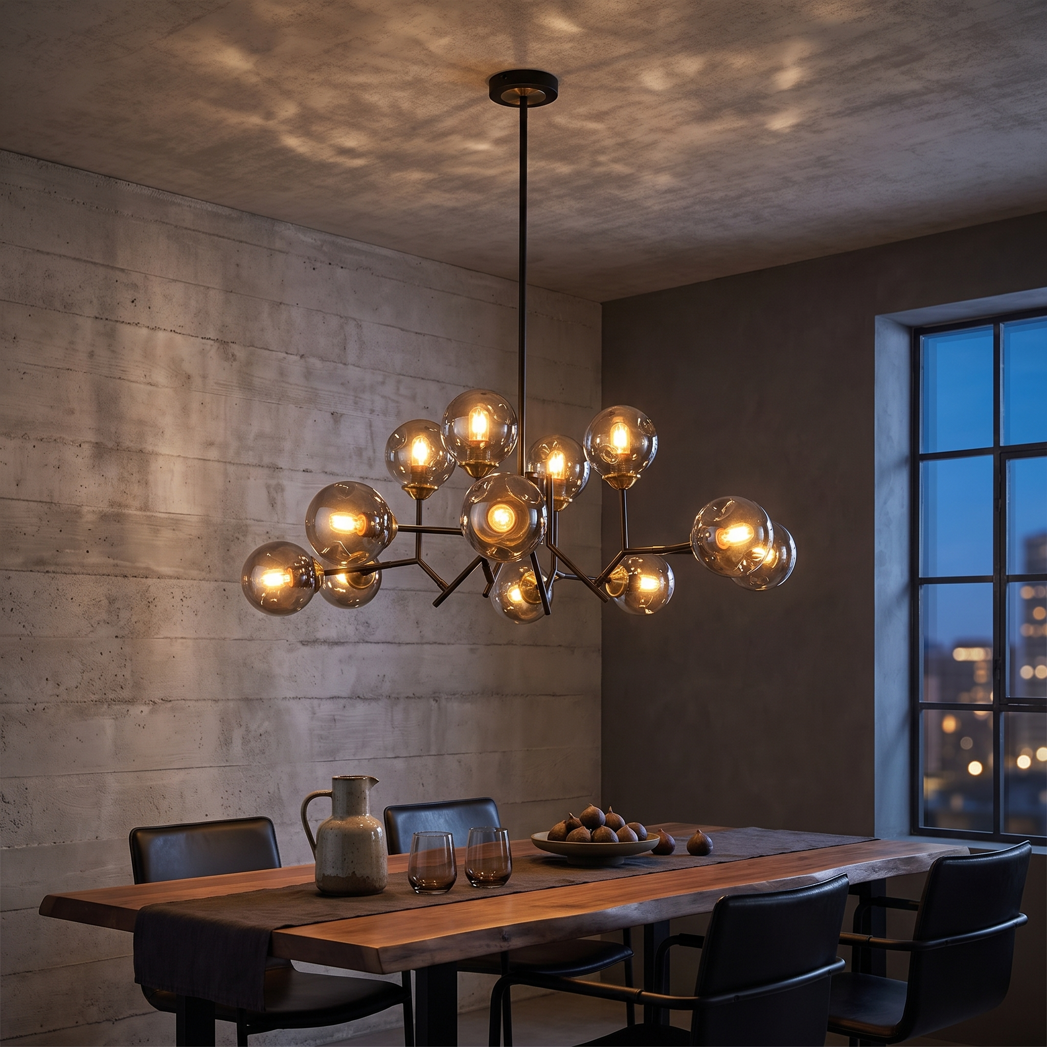 Deiphobos Twelve-Globe Glass Chandelier lit above a walnut table in a dark concrete dining room