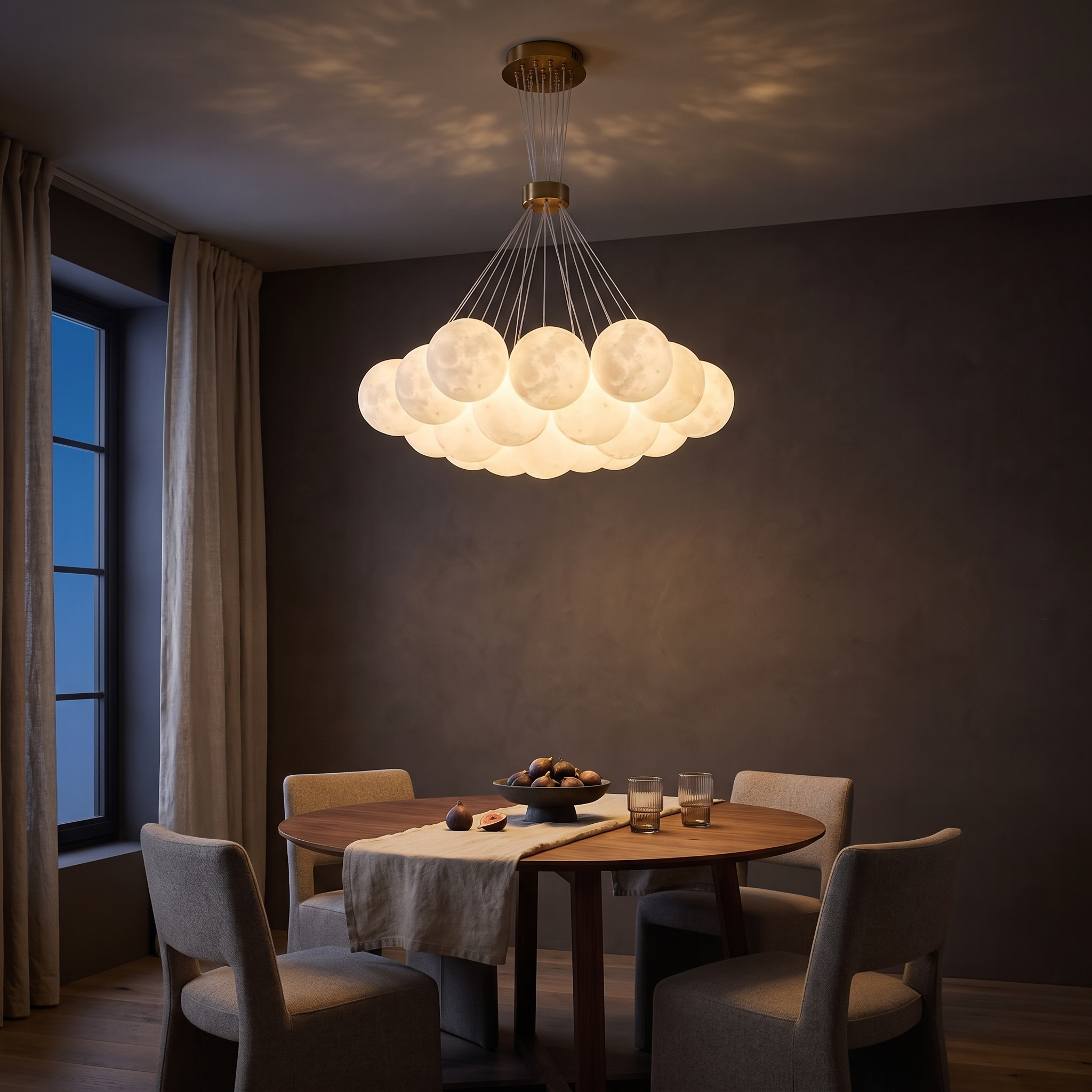 Chrysippos Cascading Globe Cluster Chandelier lit above a walnut table in a dark limewash dining room