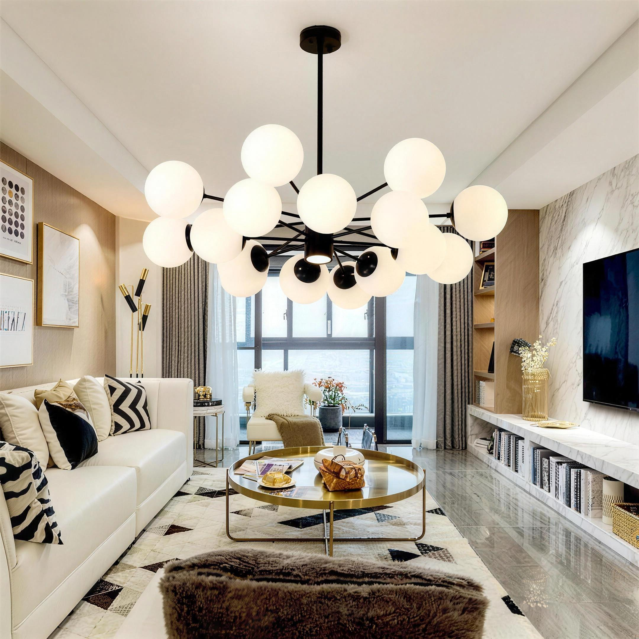 Detail of the Chairephon chandelier's hand-blown glass globes and slender metal stems