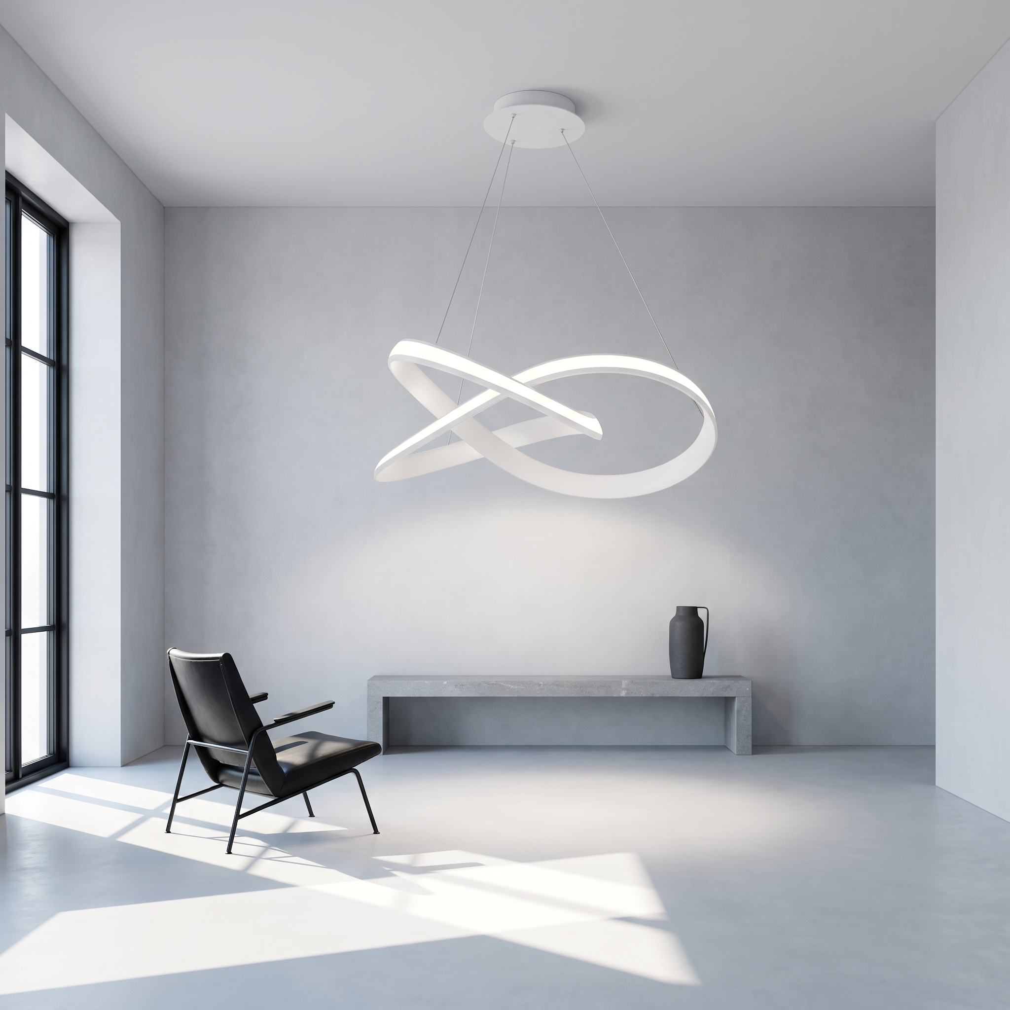 Andromeda Aluminum Ribbon LED Chandelier in white, lit and suspended in a minimalist gallery-modern living space with pale grey micro-cement walls and floor, a monolithic stone bench and a black leather lounge chair