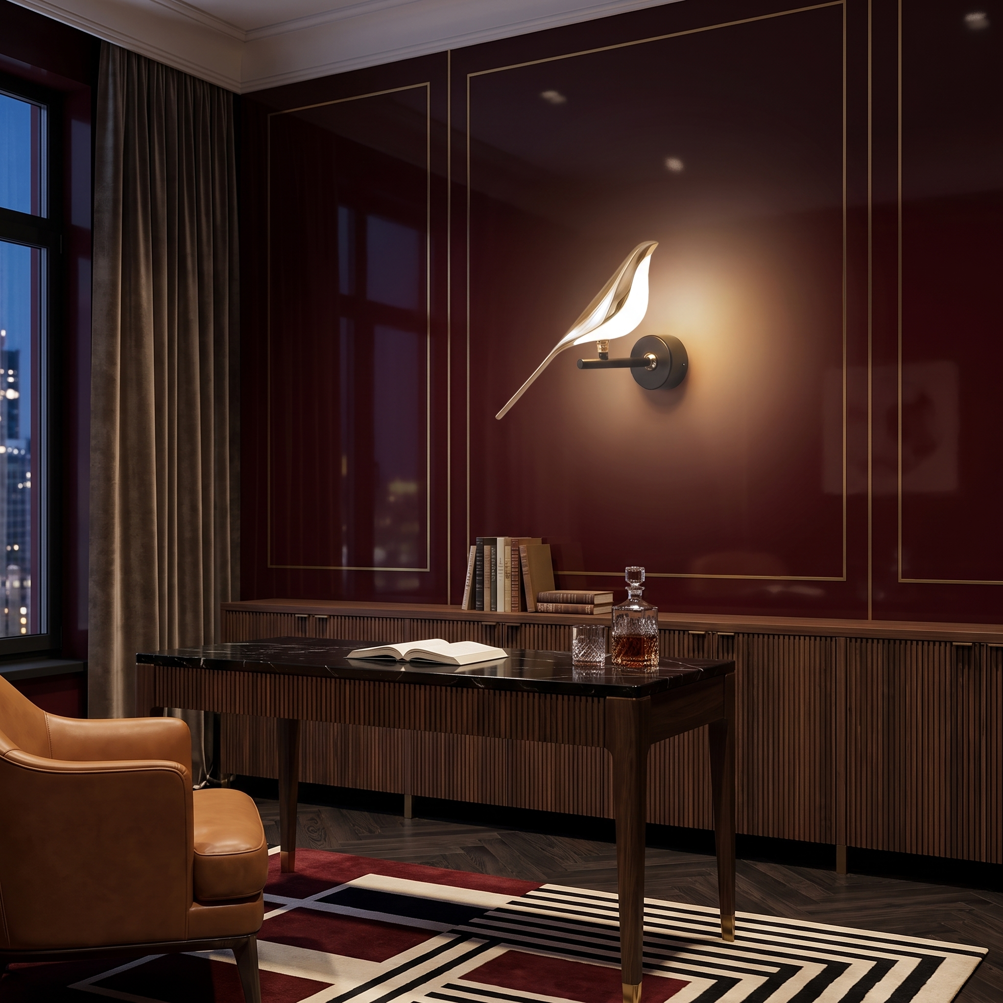 Alkyone gold bird wall light switched on above a black marble desk in an Art Deco study with oxblood lacquered panelling