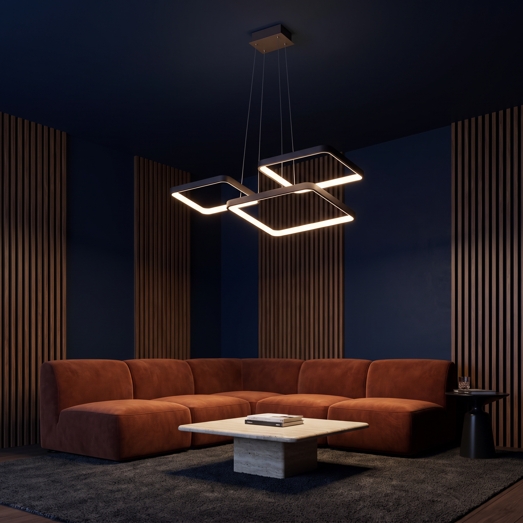 Hermokrates charcoal LED square chandelier lit above a rust velvet sectional in a navy cinema lounge at night