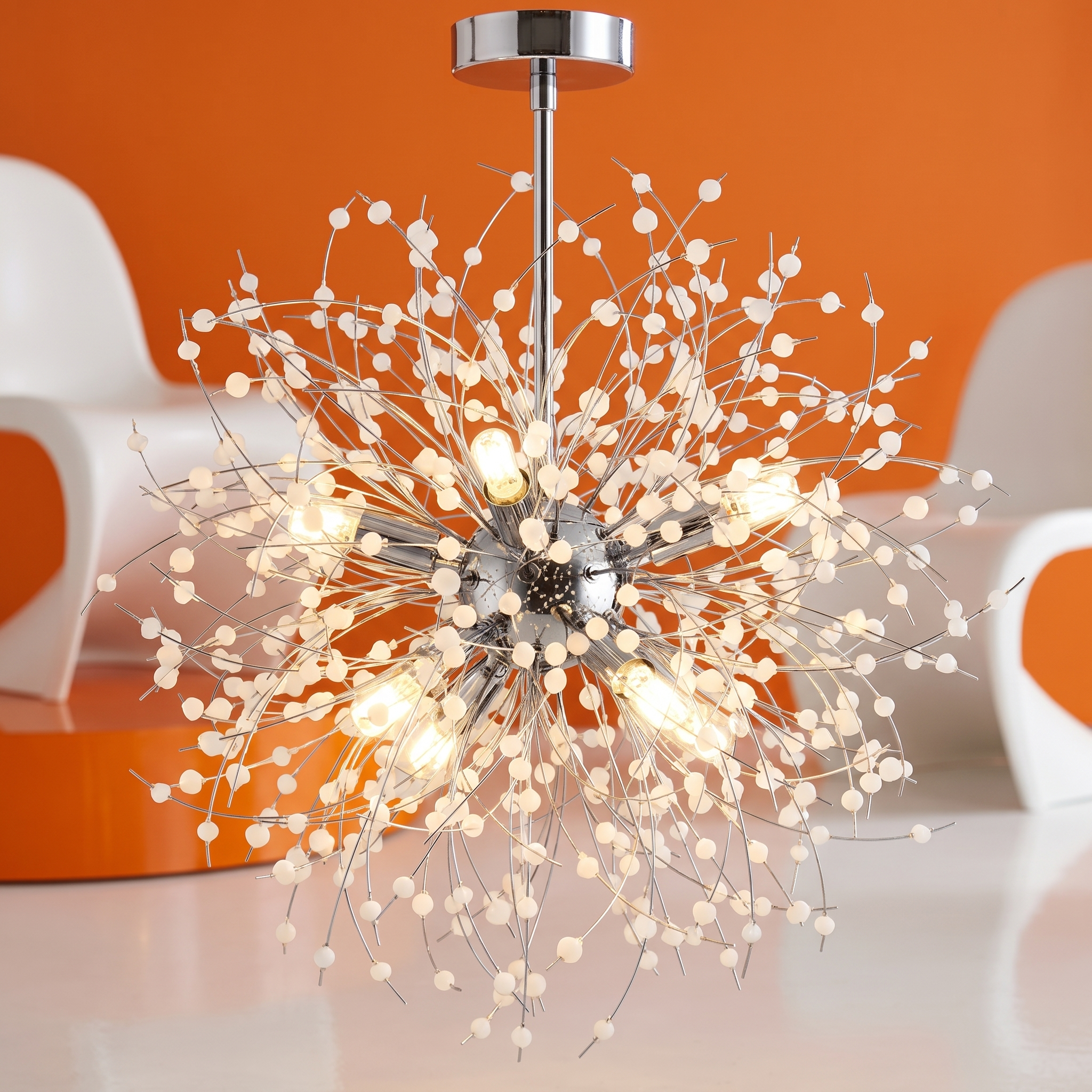 Auge mini globe chandelier in chrome in a space-age 1960s interior
