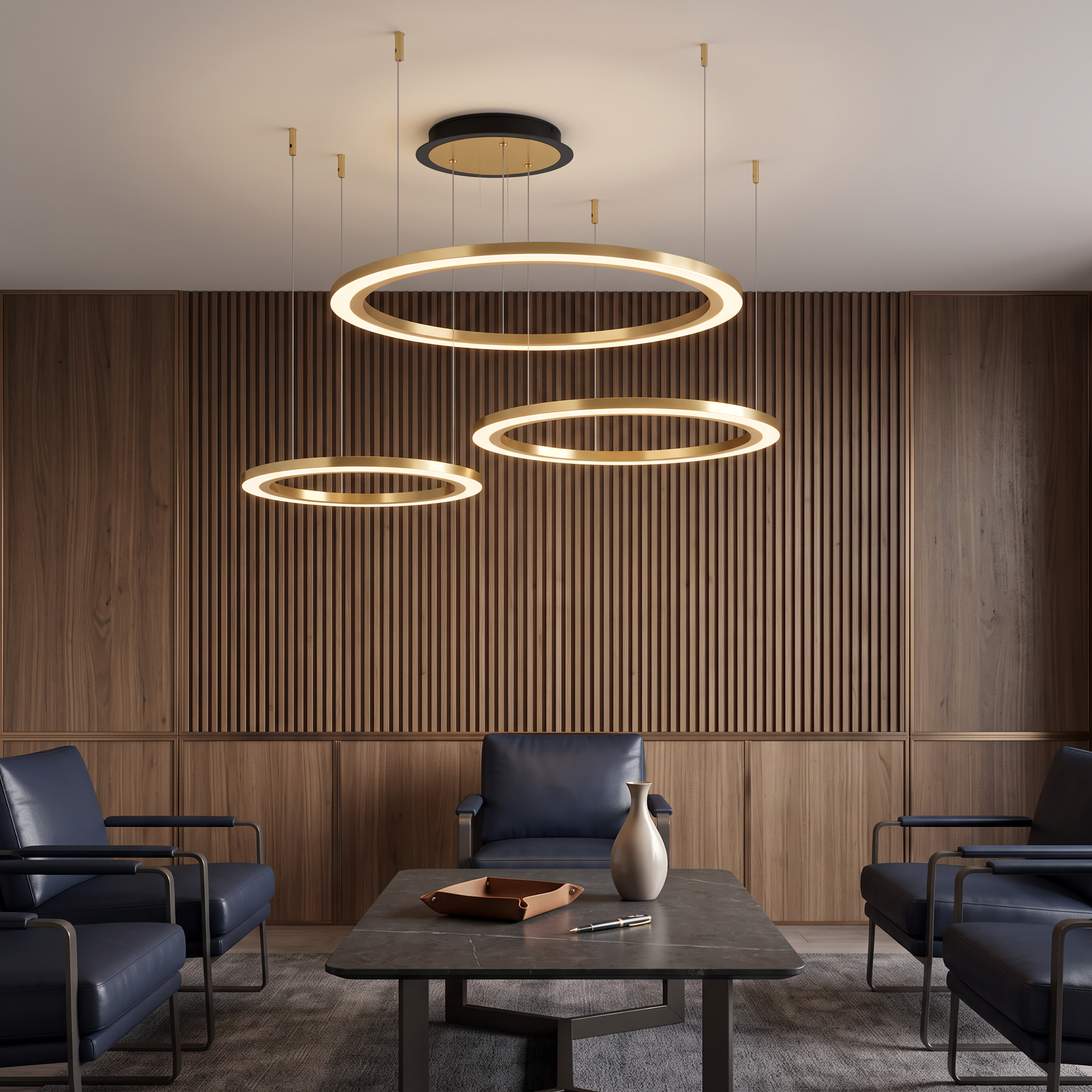 Glykera layered ring LED ceiling light three rings in gold in an executive lounge
