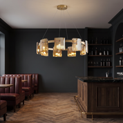 Echion nine-light acrylic ring chandelier in amber in a speakeasy bar