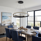 Eupolis LED ring chandelier in black in a coastal modern dining space